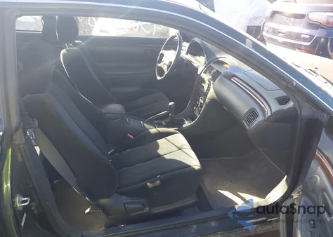 1999 Toyota Camry Solara Se V6 z USA, uszkodzony, nr VIN 2T1CF22PXXC148769